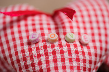 Hearts made of cloth on a wooden background. Valentines day. Valentines day greeting card.の写真素材