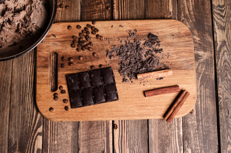 Different types of chocolate. On a wooden background.の写真素材