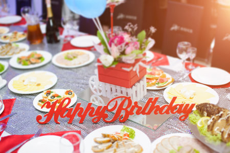 Beautiful served food on plates in restaurantの写真素材