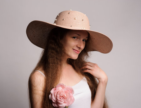 portrait of pretty woman in pink hatの写真素材