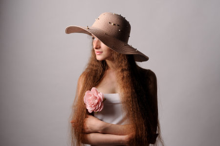 portrait of pretty woman in pink hatの写真素材