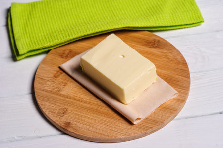 piece of butter on a wooden deskの写真素材