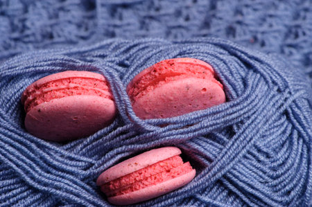 Sweet and colourful french macaroons or macaron on knittingの写真素材