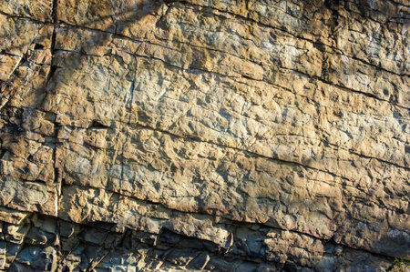 Rocky coast of the river. Landscape of countryside river. Big stones on shore of the riverの写真素材