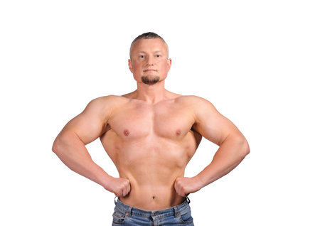 Image of muscle man posing in studio over white backgroundの写真素材