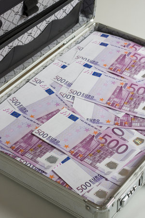 Briefcase with 500 Euro banknotesの写真素材