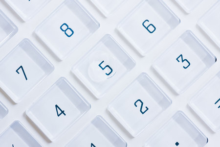 Keys of a white calculatorの写真素材