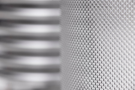 Detail of a screening machine in silvery grey - selective focus