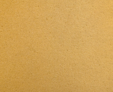 Orange dry expanded latex cellular of air-filled matrix polyurethane synthetic textile fond design. Detail close-up view with space for textの写真素材