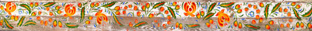 Swirl aged seamless folklore design. East slav european style. Bright red, orange, green colors drawn on white wooden board wall backdrop. Interior in rural petrikovskaya style motifの写真素材