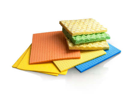 Assortment of various bright means for tidy. Multi color wisp, bast, dishrag and dishcloth for house dust wash mopping. Many rubber and cotton clean scrubber scour. Detail closeup macro viewの写真素材