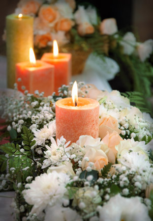 Beautiful gentle rosy color nosegay with fresh small tender buds on nuptial table. Elegant soft shine greeting card still life. Close-up detailed view with space for text on dark spa backdropの写真素材