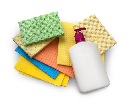 Assortment of various bright means for tidy. Container with liquid for glass cleaning, wipes, multi color wisp, bast, dishrag and dishcloth for house dust wash. Detail closeup view with space for textの写真素材