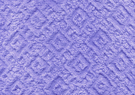Dry new luxury light purple indigo plain color wrinkled grainy woolen body spa towel with volume square rhombus fur even fond design. Close-up macro top detai lavender rug view with space for textの写真素材