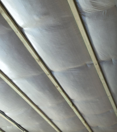 Modern manual laying mesh indoor new building. Detail closeup view with space for text on silver backdropの写真素材
