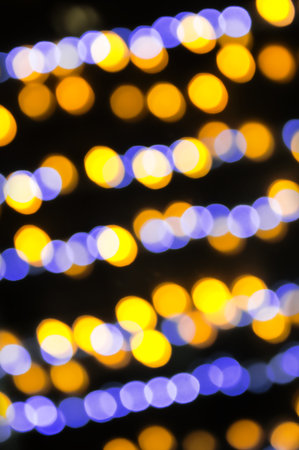 Awe beautiful christmaslight twinkly blue color dust glitz card copyspace area. Bright glittery de focus art soft sphere shape. Close-up view with space for text on night merry xmas glowball sceneの写真素材