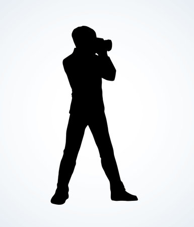 Young stylish cameraman guy make studio snapshot session on white backdrop. Dark black ink hand drawn slr lens logo emblem image picture in retro artistic contour print style. Front view with space for textのイラスト素材