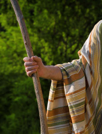 Close up retro rustic tool medieval rural herd devote adult age wise herder worker saint prayer John...