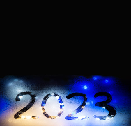 Closeup rainy freeze big view blue color hand draw glare dot merry xmas party greet card de focus art soft time shape. Cold frost rain city street car drawn eve fog spark flare flash text space letterの写真素材