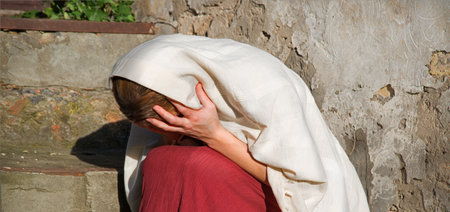 Misery lost feel mourn weep mood young lone holy jew maid slave teen lady Mary sit ask god Jesus Christ faith hope. Old retro roman history biblical adult human shame abuse white islam home text spaceの写真素材