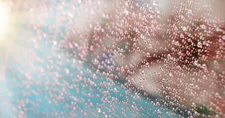 Bright cold blue gray silver shiny glare glow dot spot defocus soft blur shape. Close up macro view...
