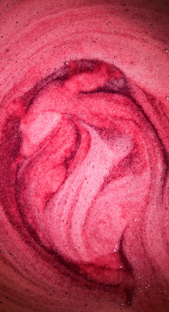 Close up macro bright light wet thick healthy sweet boil air round circle spiral spot stain drink meal concept. Past art design dark color fresh juicy soft spa oil gel sud spume text space top viewの写真素材