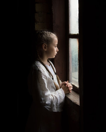 Cute light worry anxious ancient holy little human pauper waif face look trust dream. Rural dirty...