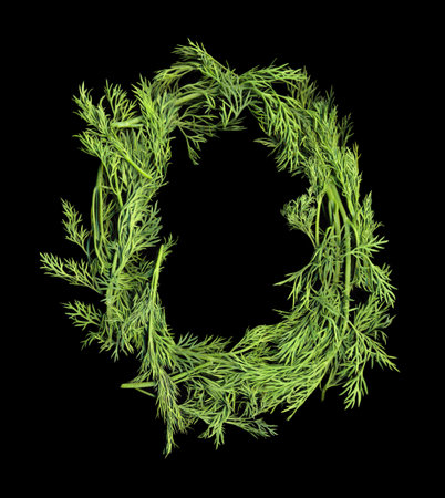 Vegetable Alphabet of dill sprigs isolated on black background