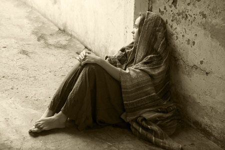 Misery tired lost grief fail cry prayer lone jew teen lady sit dirty urban street slum dream pray...