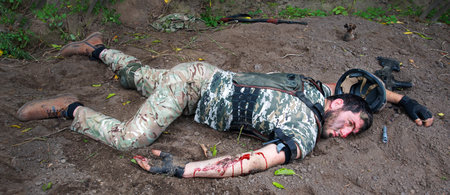Nato lose guard troop guy pain mine gun shot end protect life trauma remain fight fall dark field earth. 1 crime danger scary horror aid suffer medic shell shock hero corpse criminal trouble conceptの写真素材