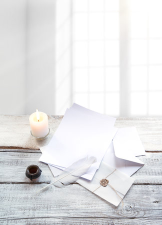 Closeup top view classic rustic age send notepad gift book tool art style sign symbol craft delivery. Grunge wax seal stamp rope tie tag close pack light worn table desk text space artist banner decorの写真素材