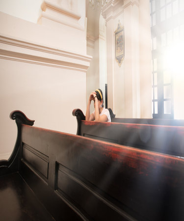 Sacred young lady think plead beg ask Lord Jesus Christ bless concept Saint holy history upset teen...
