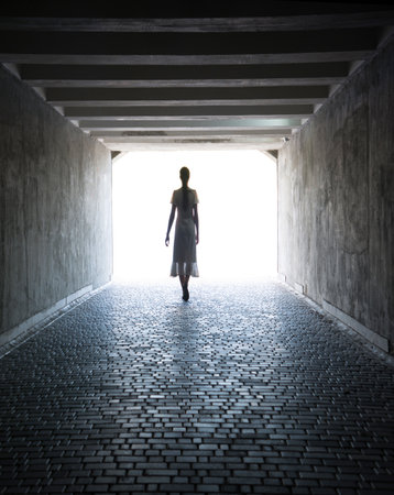 Dirty abandon lead brick arc cell hall heaven room ruin lit day sun sky glow. Gloomy lady figure go travel grunge abstract male guy man city castle house cave hole life death dream trail frame conceptの写真素材