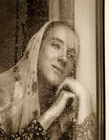 Young shawl veil even despair mood feel teen lady ask home text space. Holy shy mental happy joy wait hope relax rest see light white cool wet cold day morn crisisの写真素材