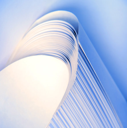 Creative circular big blue blur stripe note pad draw element heap pile copyspace. Close up view...