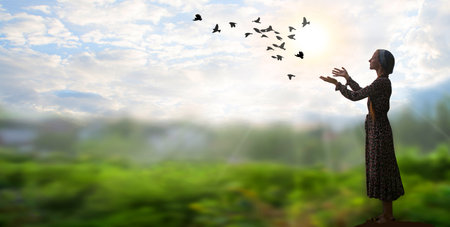 Lone worry sad lady face wish love praise thank holy god help light blue sky text space. Alone devot young teen kid soul help trust raise bless avian dove spirit draw vintage wild sign conceptの写真素材