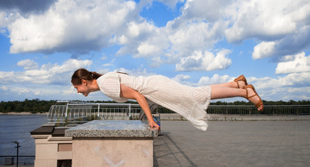 Modern adult slim sporty lady raise foot well life funny joy stretch arm energy body skill move leg...