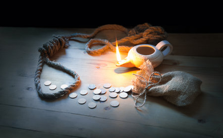 Retro dark earn golden bag wallet save pouch purse sack piece value stress light fire table Hang life man neck dead end cord tie sale cash price sin profit lie arrest die failur storyの写真素材