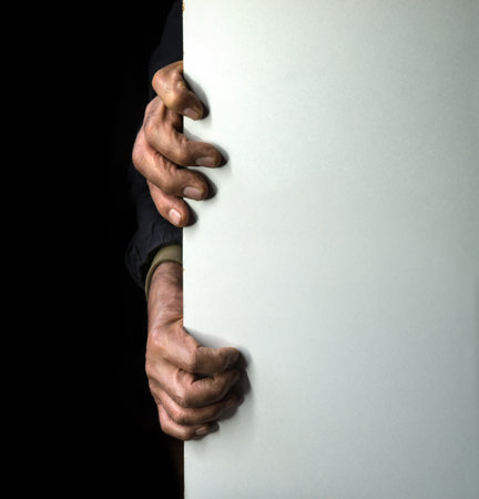 Close up old age female finger felon house hope dark black text space Closeup dirty guy peep peek...
