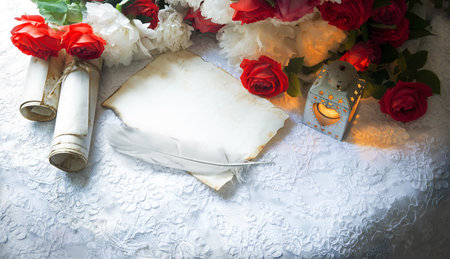Past age wed page teach bible love mail post study pray lamp light desk text space Holy god christian faith romance art red floral bloom bud petal vase close up top view still life frame symbolの写真素材