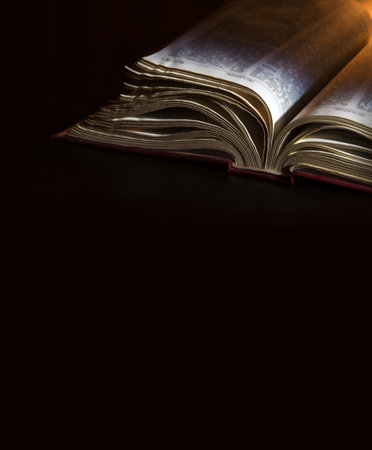 Grunge age dirty rough rustic brown jew psalm pray torah law letter shine dark black wooden desk...