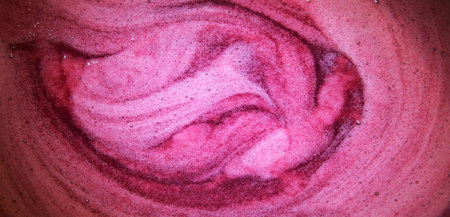 Close up macro bright light wet thick healthy sweet boil air round circle spiral spot stain drink meal concept. Past art design dark color fresh juicy soft spa oil gel sud spume text space top viewの写真素材