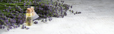 Old retro rural blue lilac lavande tea smell dry bud green petal jar cure ill wash soap vial bowl white wood table text copy space. Beauty rustic wed love blank empty heal card close up top macro viewの写真素材
