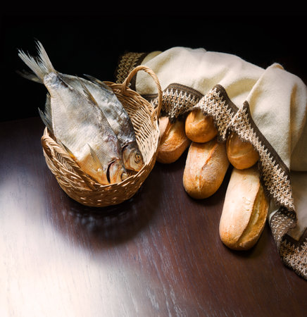 Holy raw rural box pita cake bakery Lord pray bless retro Israel sign story. Close up view white jew human man boy towel catch cathol dry sea supper still life dark black wooden table desk text spaceの写真素材