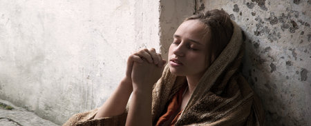 Misery tired lost grief fail need cry lone jew teen lady sit dirty urban street slum dream god food help faith hope. Old retro biblic alone needy ill sick kid suffer crisis lack war man temple houseの写真素材