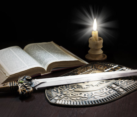 King age army paper page learn believ pray law steel iron metal sharp dark black table text space...