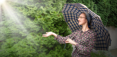 Young lone sad dress veil wait upset mood feel joy smile teen lady face dark morn yard text space. Shy hand hold hope see light cool cold rural urban city way date fall day evenの写真素材