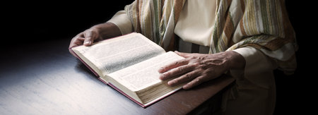 Closeup past elder age girl trust church school biblic gospel word israel judaism torah law symbol concept. Devote adult guy pastor hold arm preach dark black wood desk spaceの写真素材