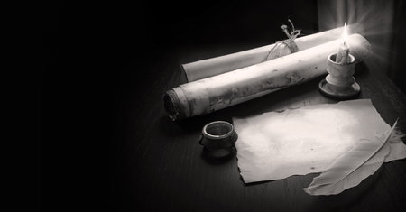 Grunge worn age holy god belief torah law author page dark black wood desk table still life banner...