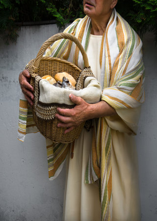 Holy rural multiply many jewish barley bakery Lord bless retro Israel crowd feast sign symbol story. Closeup view white saint jew boy guy still life supper nature green field text space gospel conceptの写真素材